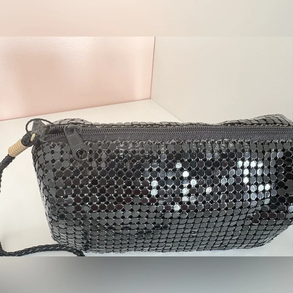 Avon 1994 Vintage Stylish Black Night Party Purse Gold details on the straps.